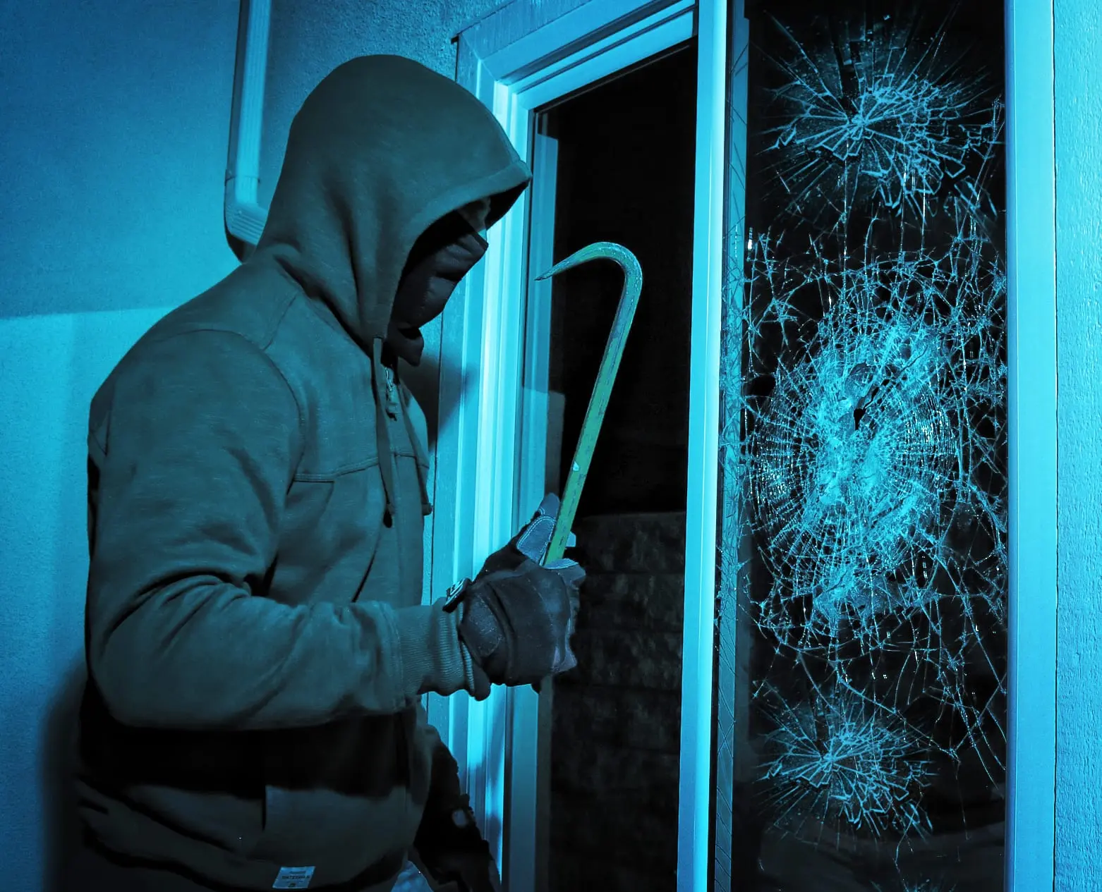 Security window film installed on glass window for shatter resistance and added protection